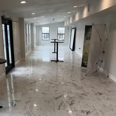 Polished marble-look tile flooring in open living space — Rockwall, TX | Goldstar Renovations