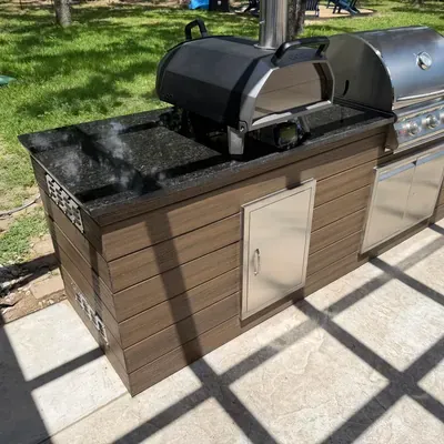Outdoor kitchen grill island with granite countertop — Rockwall, TX | Goldstar Renovations